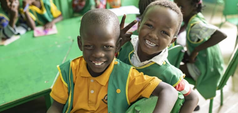 RS61488_220315_031-lpr Abdallah (5, L) and Alassane (5, R) sit together at a ChildFund-supported ECD center in Ziguinchor Region, Senegal.
“Tell me what your childhood was like, I’ll tell you who you are. It is here that the children develop their confidence, their abilities, health outcomes and intelligence. This is what we foster,” says ECD director Maimouna Fall.
Ziguinchor Region, Senegal, West Africa.
March 15, 2022.
Photo by Jake Lyell for ChildFund.